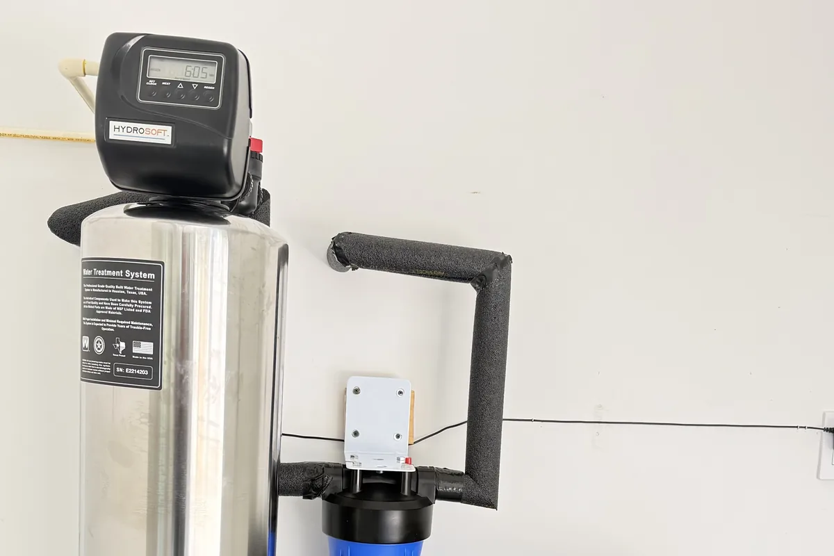 Water softener and treatment tank installed in a Houston home