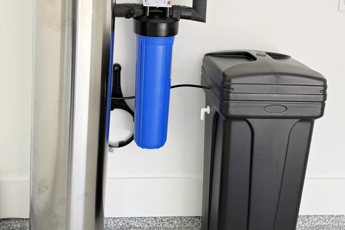 Whole-home filter housing and brine tank installed in a Houston home